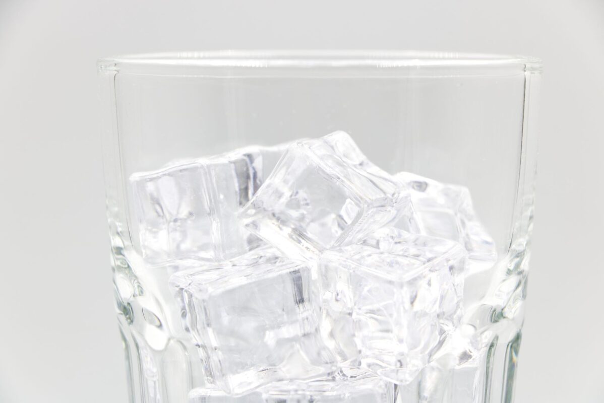 Clear ice cubes in a glass
